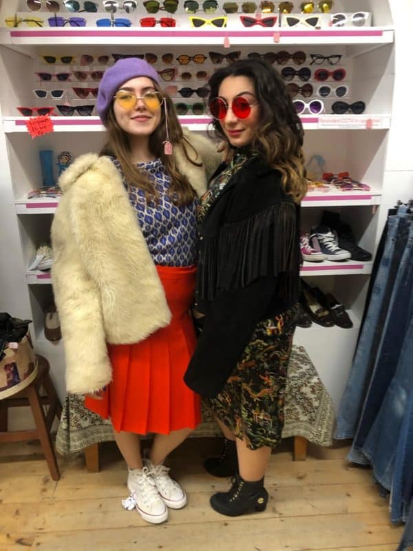 Picture shows models wearing vintage sunglasses inside St Cyr Vintage shop.