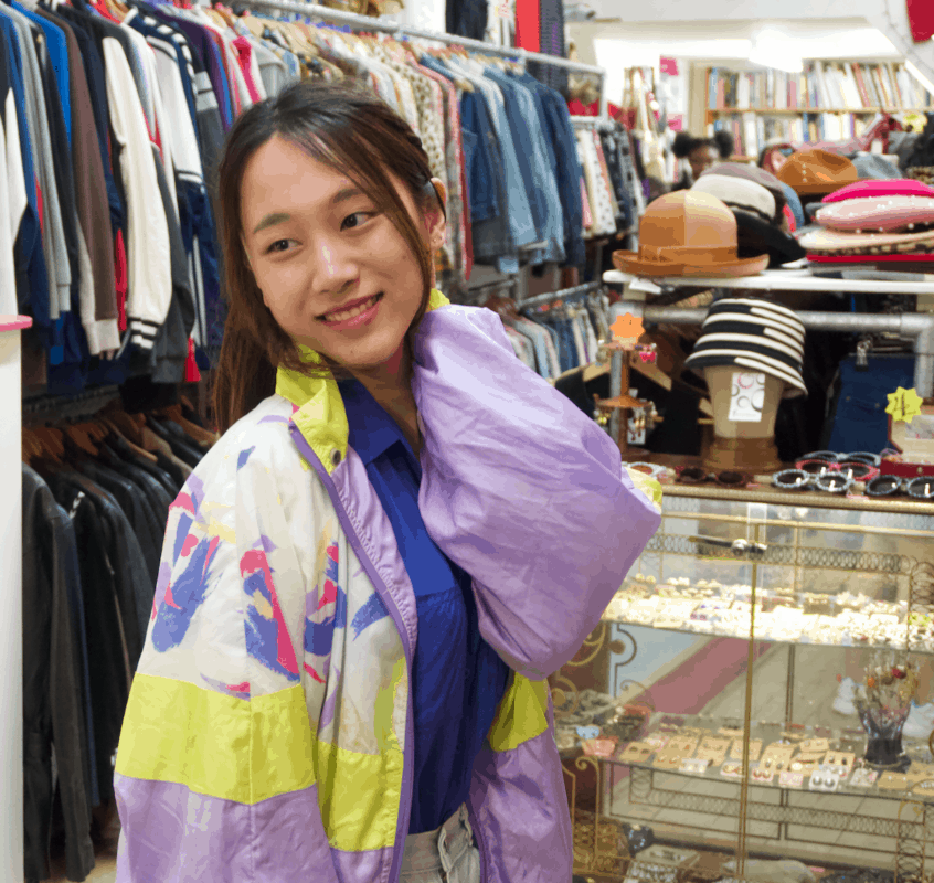 Model poses in 90s sports wear at St Cyr Vintage