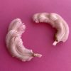 A pair of Vintage Feather Earrings in Pink which have four layers of feathers (plastic) and a rhinestone detail. The back has a clip on fastening and they are very pretty
