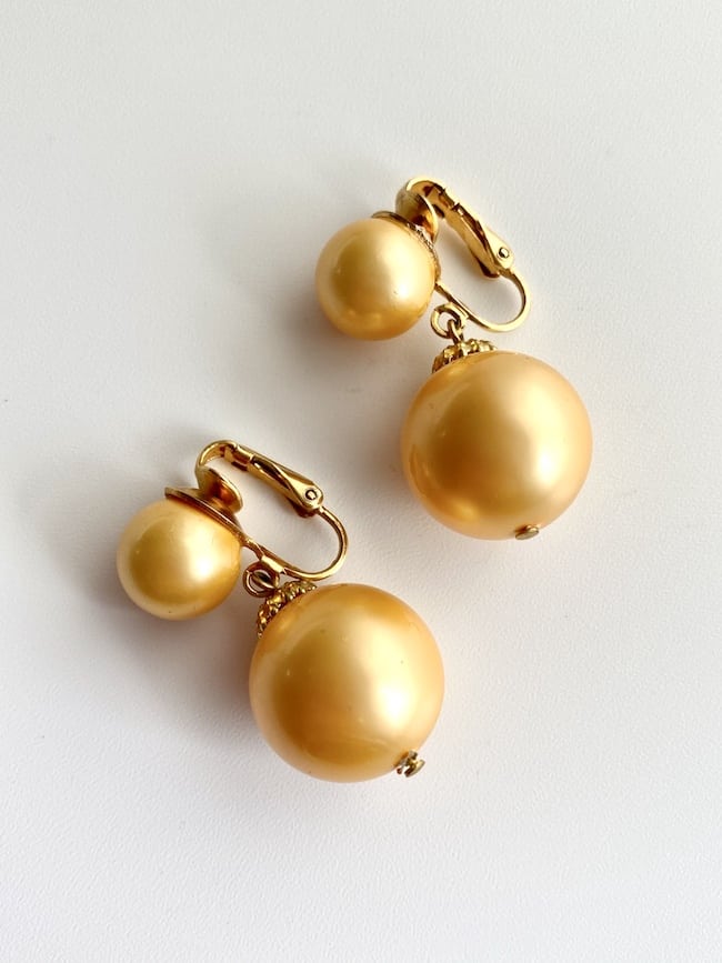 image of a pair of Vintage 1960s Earrings in Peach deadstock white background