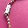 image showing maulers mark on a Vintage Rosita Glass Pearl Necklace clasp
