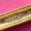 an image of the back of a vintage SAL Swarovski brooch showing the makers mark, S.A.L©
