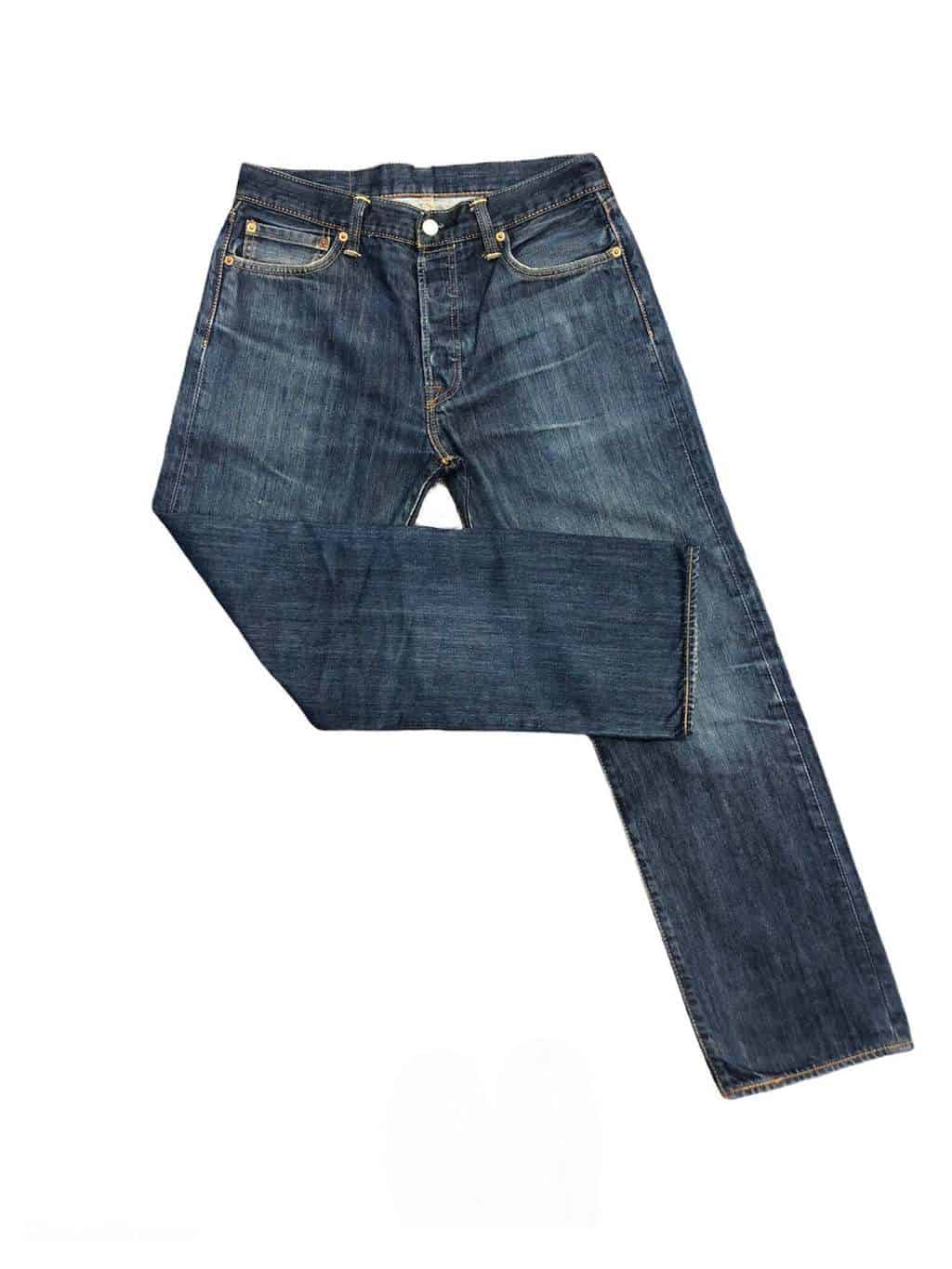 Levis 501 jeans in dark blue denim with whiskered hips and leather 