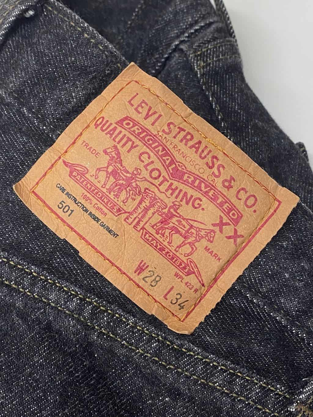 90s vintage Levis 501 jeans USA made black grey with red tab - W27 x L32 -  St Cyr Vintage
