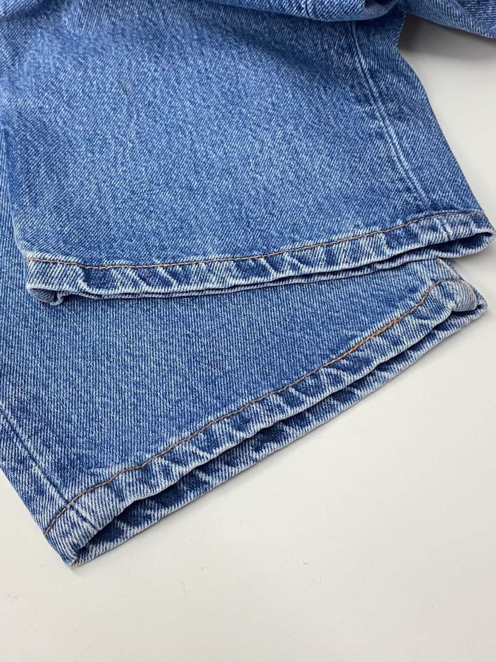 90s vintage Levis 501 jeans USA made blue stonewash with red tab