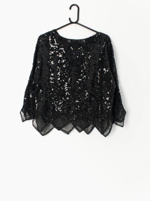 Vintage black sequin top with floral pattern and profiled hem - Medium / Large