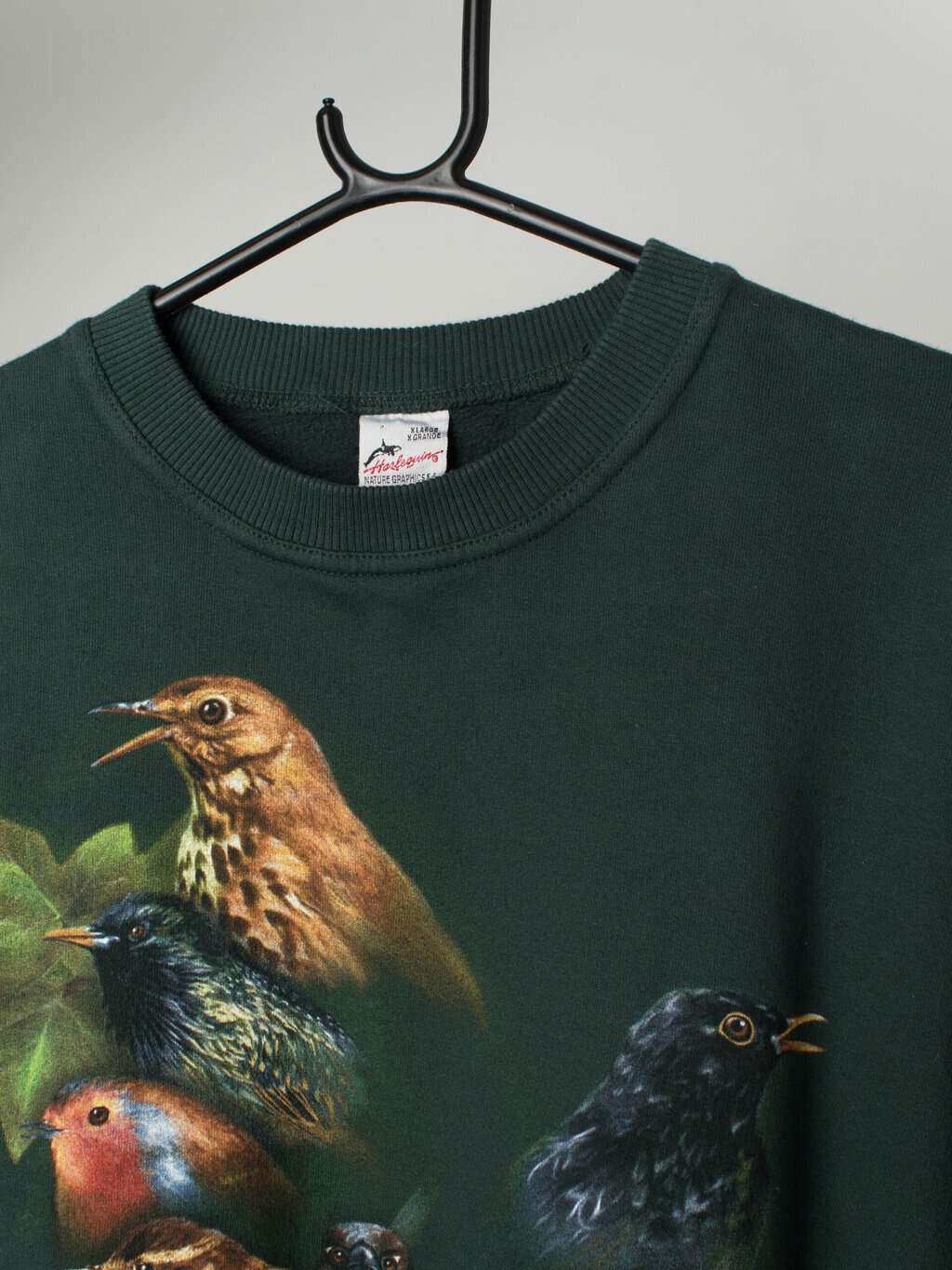 Vintage forest green sweatshirt with bird graphics, 90s - XL