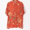 Bright Hawaiian shirt in warm orange with liquor bottle and cocktail pattern - Large