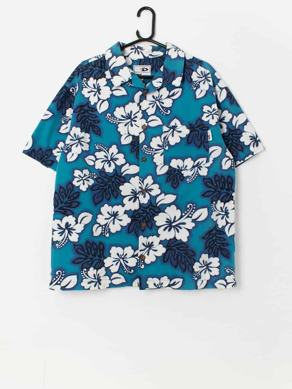 Vintage Hawaiian shirt in blue with a white and navy floral print - Medium / Large